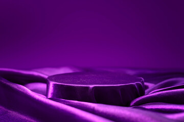 Satin violet cloth podium, product promotional display, black stage, elegant luxury platform for...