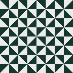 Fototapeta premium Geometric seamless pattern with White and green triangles.