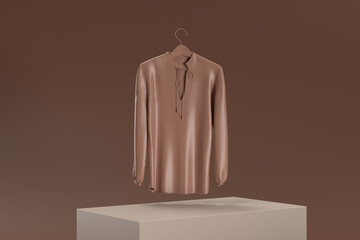 A brown shirt with a tie hanging from a hanger