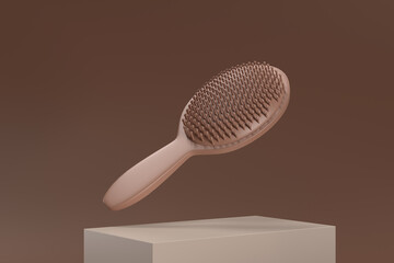 A brown brush with a handle is shown in mid-air