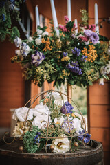 Wooden wedding interior reastaurant decoration with flowers and candles