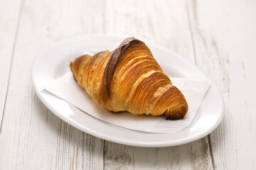 croissant isolated on white plate