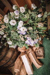 Wooden wedding interior reastaurant decoration with flowers and candles