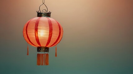 Obraz premium Illuminated Red And White Striped Paper Lantern Hanging