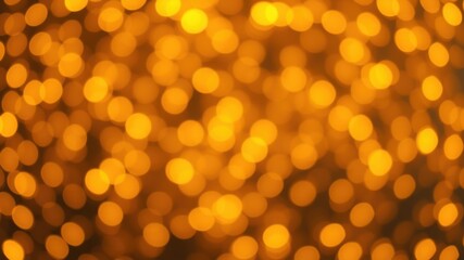 A mesmerizing abstract background of blurred golden lights, creating a sense of warmth and festivity.