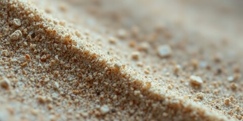 A Close-Up View of a Rough and Textured Surface Covered in Fine Grains, Revealing the Delicate Details of Nature's Design