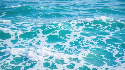Obraz premium Turquoise water with foamy waves in the ocean, marine, background, beautiful