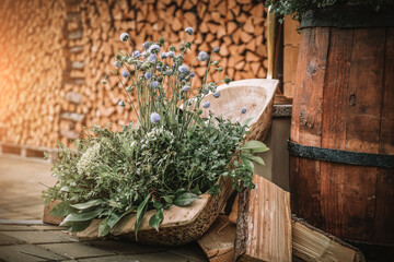 Wooden wedding interior reastaurant decoration with flowers and candles
