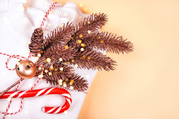 Christmas flatlay with cozy white sweater and decoration