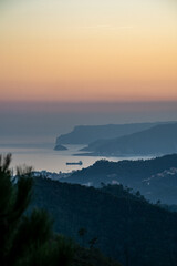 sunset over the sea: Isle of Bergeggi and Capo Noli, Ligurian Sea