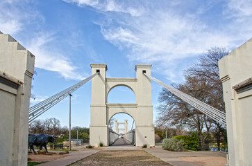 Waco Suspension Bridge tower and cables against the sky
