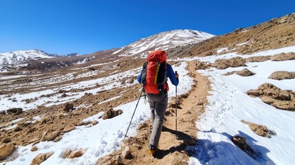 Fototapeta premium Hiking adventure in snowy mountains nature photography outdoor exploration scenic view