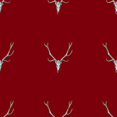 Seamless pattern Red deer skulls on red Background for Halloween design Scull wrapping paper...