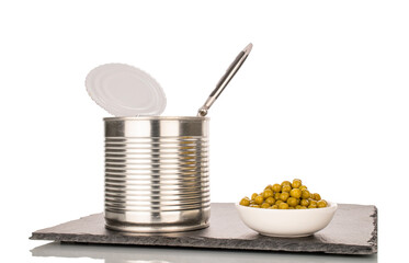 Canned green peas in a metal can, close-up, isolated on a white background.