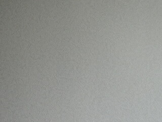 gray plain paper background with soft ribbed texture with abstract perforation, monochrome graphic resource with fine textured pattern