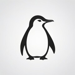 Obraz premium A simple black and white silhouette of a penguin.