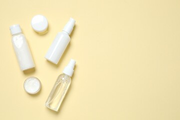 Natural cosmetic products on color background, top view