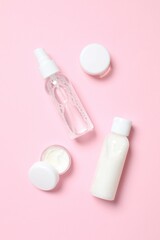 Natural cosmetic products on color background, top view