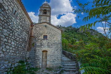 Fototapeta premium The Church of Our Lady of Remedy on the slope of St. John mountain above Old Town of Kotor, Montenegro.