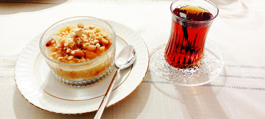 Ashure dessert with legumes and dried fruits named aşure or asure . Noah’s pudding in the bowl.