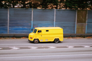 Cash-In-Transit Portuguese Yellow Armored Delivery Van in Motion
