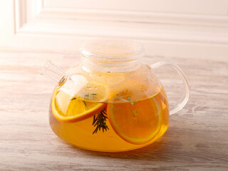 Hot infused drink with orange and rosemary