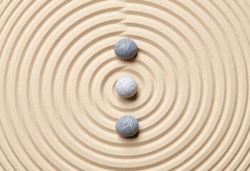 zen stones on sand