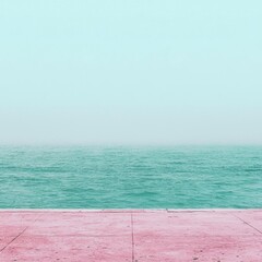 Obraz premium A serene seascape with a pastel-colored horizon and a pink walkway.