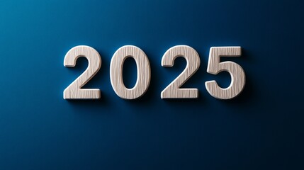 Wooden Numbers 2025 on Blue Background - New year, future, anticipation, planning, goals.  Simple wooden numbers against a dark blue backdrop.