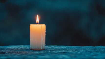 Single Lit Candle on Rock - Serenity, remembrance, hope, peace, light. A single candle burns brightly, symbolizing inner strength and resilience.