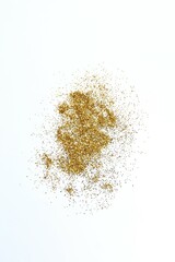 Beautiful golden confetti on a white background