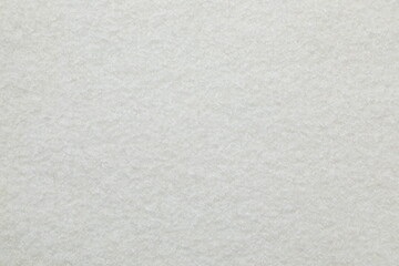 White cuddle teddy bear fabric as background, top view © Sunlight