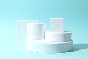 Props for product photography. Different podiums on a colored background