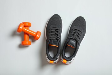 Sport equipment on gray background, top view