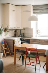 A spacious kitchen-living room in the apartment. No one, no people.