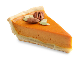 Piece of tasty homemade pumpkin pie with seeds and nuts isolated on white