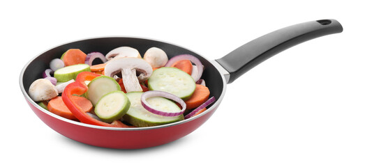 Frying pan with mix of fresh vegetables and mushrooms isolated on white