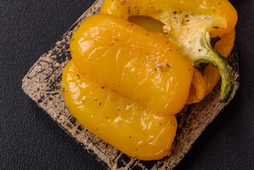Yellow sweet pepper cut in half and grilled with salt, spices and herbs
