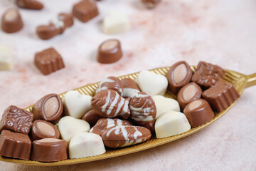 Handmade chocolate with pistachios, dark and milk chocolate pieces.