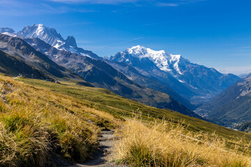Obraz premium Mont Blanc, Monte Bianco mountain summit in the Alps. The highest mountain in Europe. Snow and glacier covered high altitude snow mountain in the Alps. The top of Montblanc Chamonix valley landscape