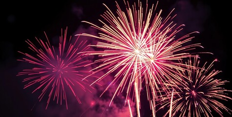 Obraz premium Golden Fireworks - Countdown To Midnight - Abstract Defocused Background. 2025 New Year’s Eve Countdown Fireworks