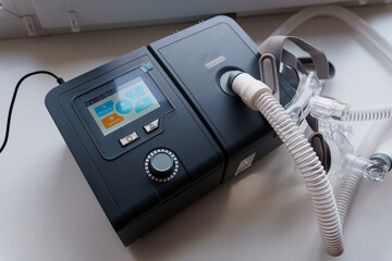 A Modern CPAP Machine with Digital Display and Tubing