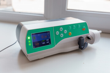 Advanced Medical Infusion Pump with Digital Display and Control Interface