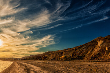 Beautiful morning landscape of the shore of a reservoir with high clay banks