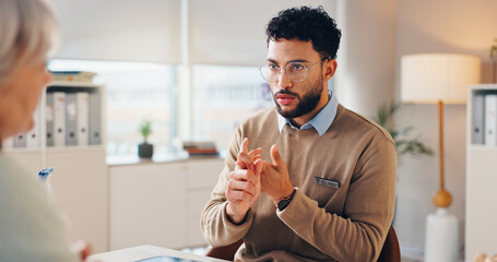 Mature woman, male doctor and advice in consultation, medical services and professional opinion. People, symptoms and patient in clinic for appointment, checkup and healthcare in explaining diagnosis