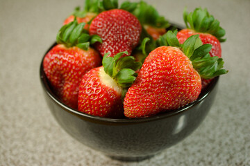 Juicy Strawberries in a Ceramic Bowl