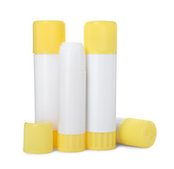 Many different glue sticks isolated on white