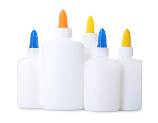 Many bottles of glue isolated on white