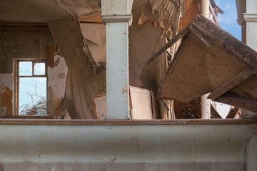 Interior of the abandoned and destroyed house with broken walls