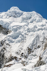Stunning landscape of Andes mountain ridge cover by cloud and copyspace at Cordillera Blanca